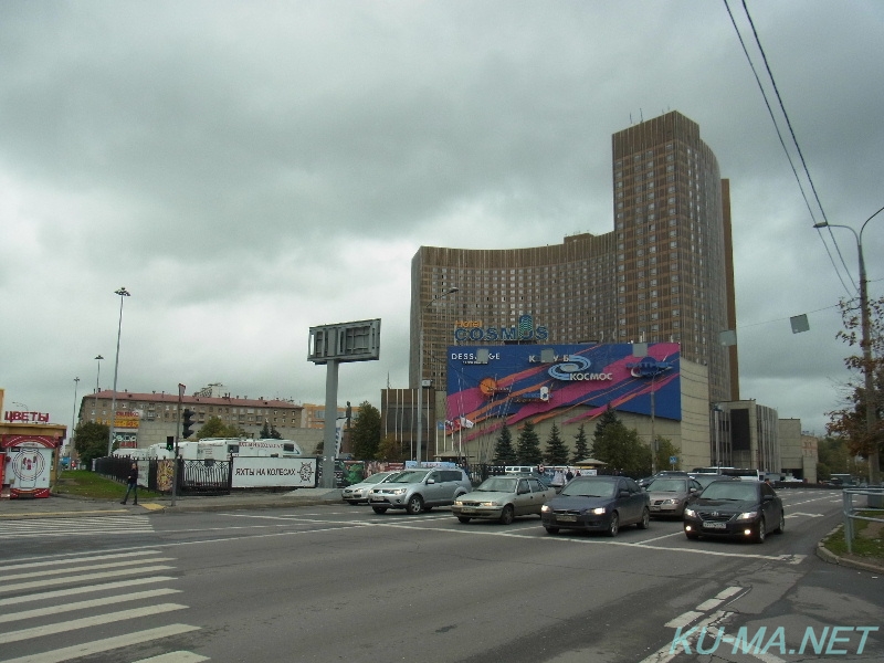 Photo of The Cosmos Hotel appearance and the image of  space signboard